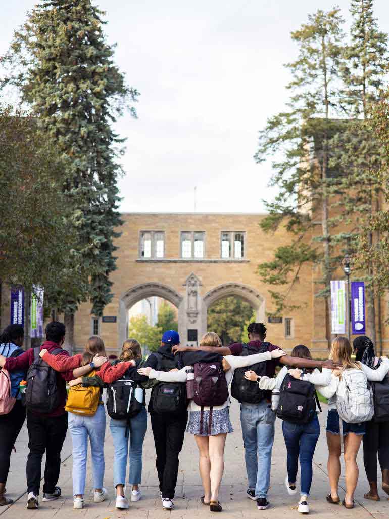 students walking together on campus